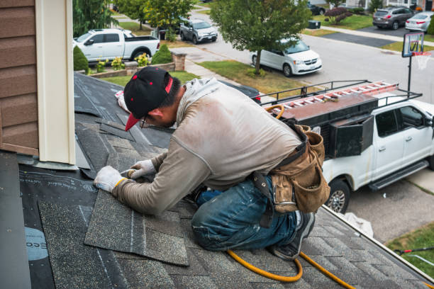 Professional Roofing technician working in Glen Wild, NY